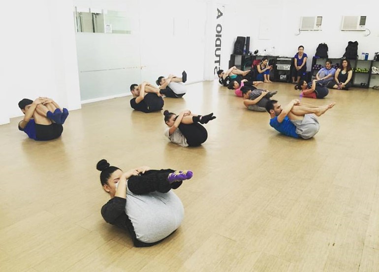 dancers-stretching-on-floor