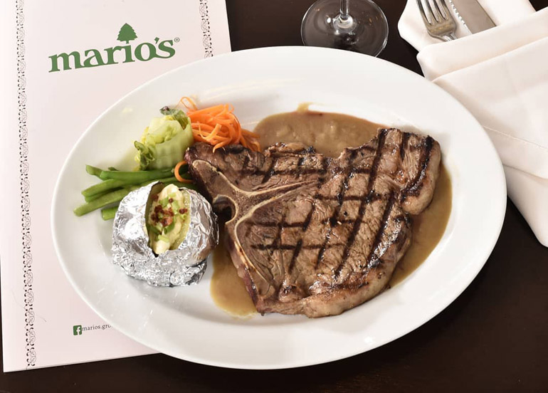 Mario's Restaurant Steak with a side of baked potato