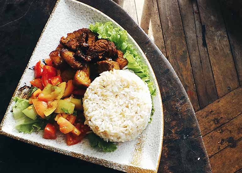 Grilled Pork Chop with Organic Rice and Mixed Veggies from Cafe Cueva